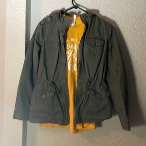 Green Jacket with yellow shirt